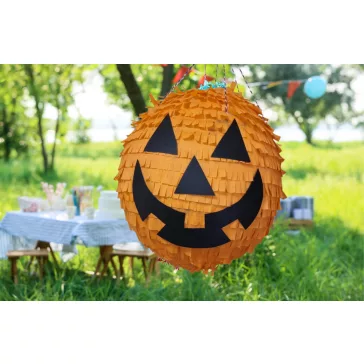 Vigyorgó narancssárga halloweeni tök alakú party pinata