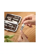 7 darabos manikűr és pedikűr készlet barna, cipzáras tokban, acél körömvágóval és reszelővel