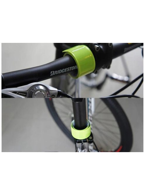 Jól látható, neon színű, önzáródó fényvisszaverő karpánt csuklón viselve sötétben.