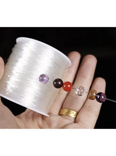 Kruzzel 40 méteres átlátszó elasztikus gumiszál tekercsben, karkötők és ékszerek készítéséhez, 0.8mm vastagság